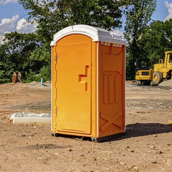 how often are the portable restrooms cleaned and serviced during a rental period in Coalville